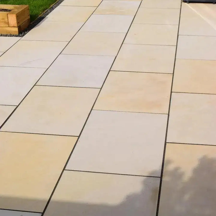 ivory beige smooth Indian sandstone paving slabs 